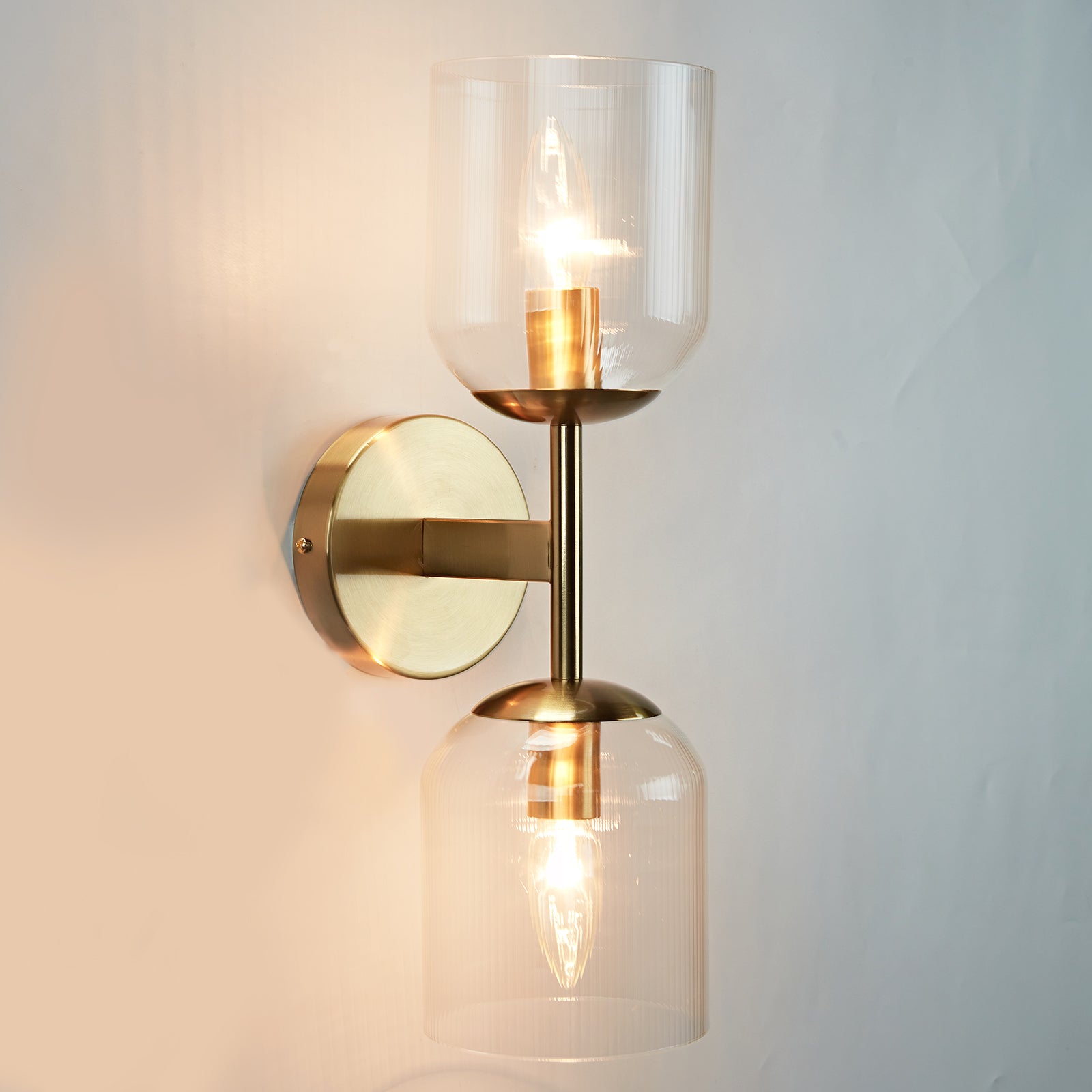 Antique Bronze Double Sconce with Ribbed Glass Shades and Bell-Shaped Design for Durable Indoor Lighting - Ideal for Bathrooms and Bedrooms
